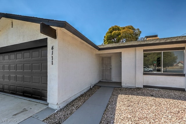 entrance to property with a garage