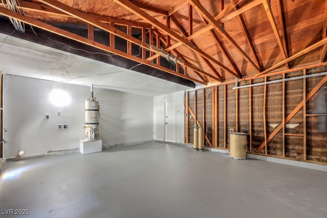 garage featuring secured water heater