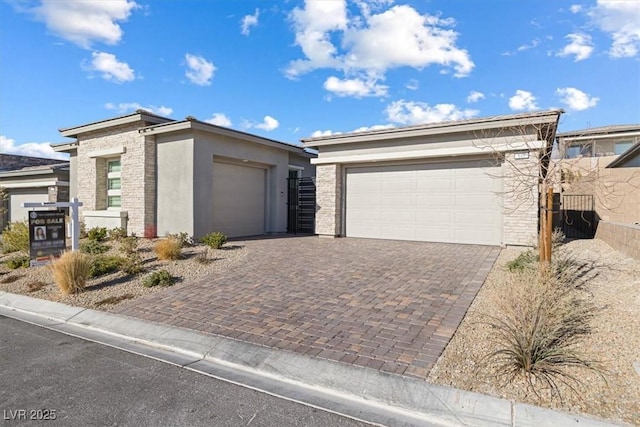 ranch-style home featuring a garage