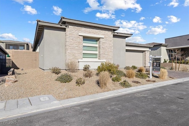 view of side of property featuring a garage