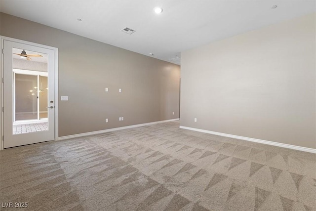 unfurnished room with light carpet