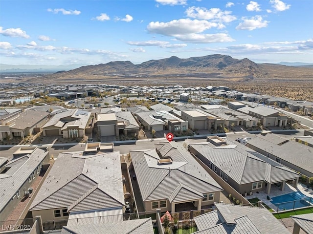 drone / aerial view featuring a mountain view