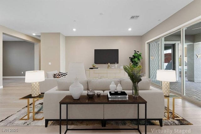 living room featuring light wood-type flooring