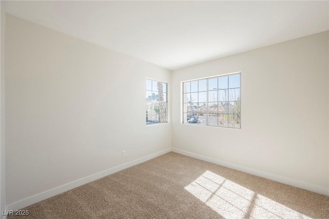 view of carpeted spare room