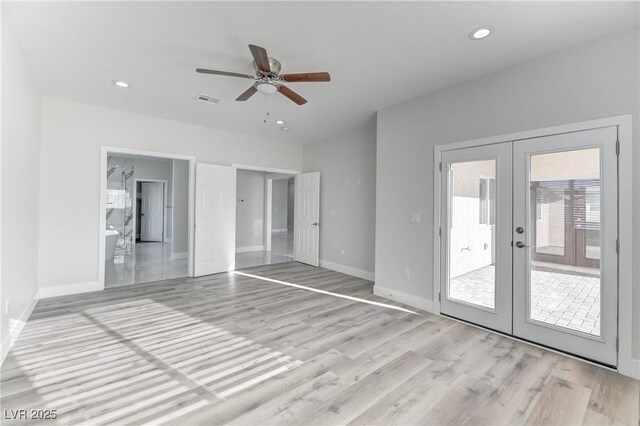 unfurnished bedroom featuring ceiling fan, light hardwood / wood-style flooring, french doors, and access to outside