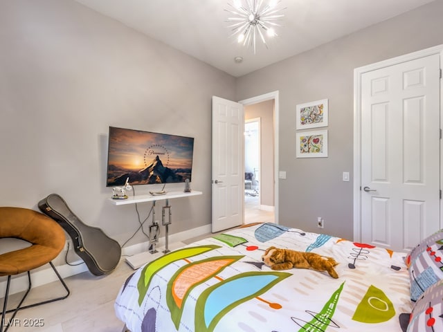 bedroom with an inviting chandelier