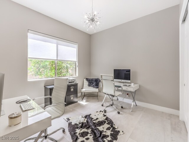 office space featuring a notable chandelier