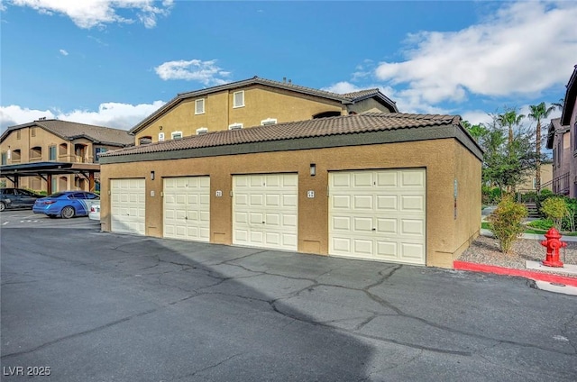 garage with a carport