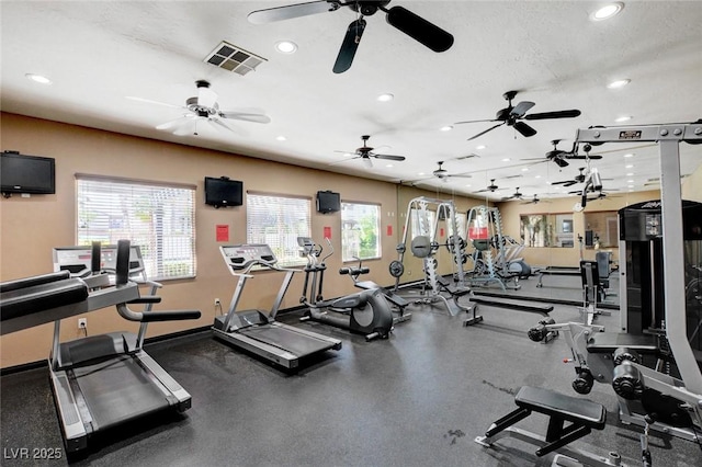 exercise room featuring a healthy amount of sunlight