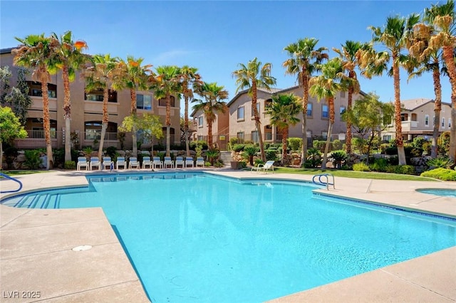 view of swimming pool featuring a patio