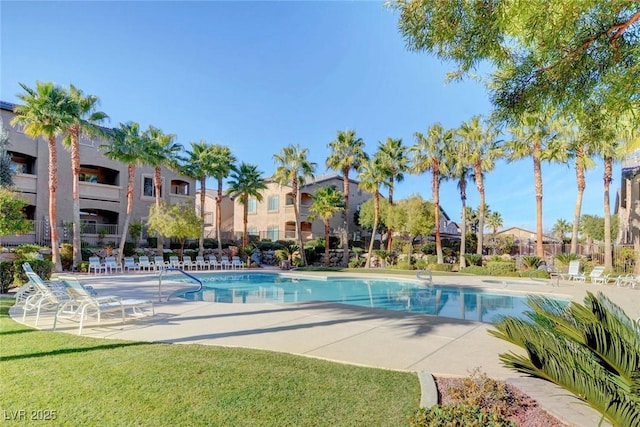 view of swimming pool with a patio area