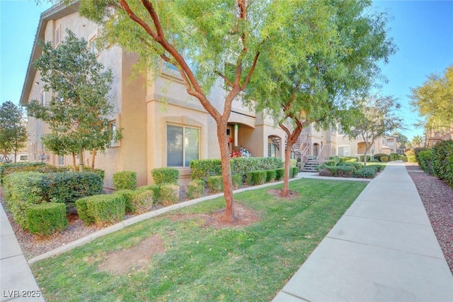 exterior space with a front yard