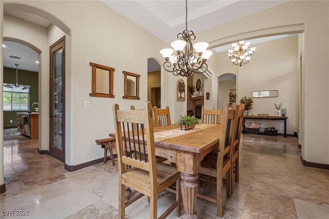 dining area with a notable chandelier