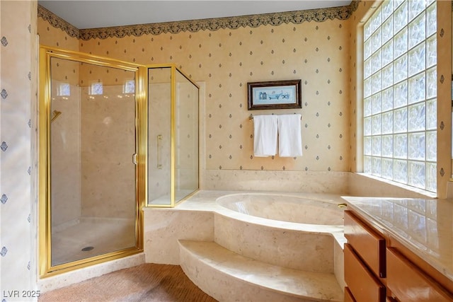 bathroom with shower with separate bathtub