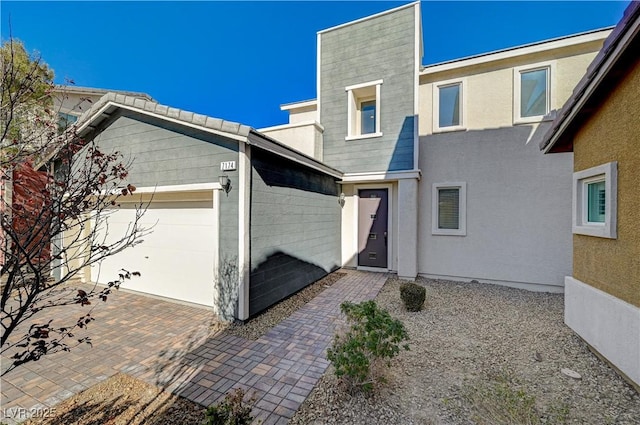 view of front of property with a garage