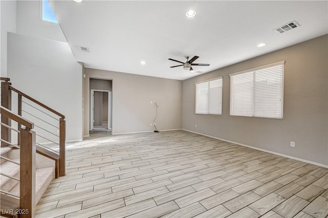 empty room featuring ceiling fan