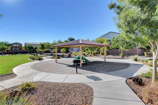 view of community featuring a gazebo and a lawn