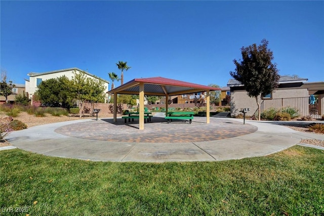 view of community featuring a gazebo and a yard