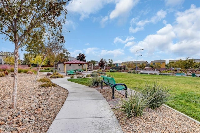 surrounding community featuring a gazebo and a yard