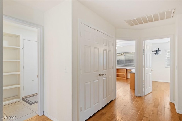 hall featuring light wood-type flooring