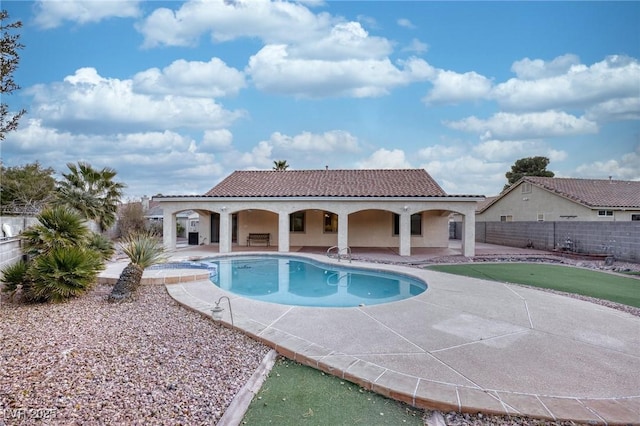 view of pool featuring a patio