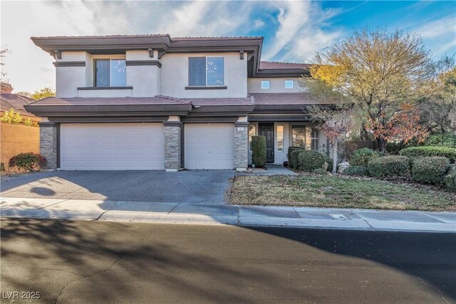 view of front of home with a garage