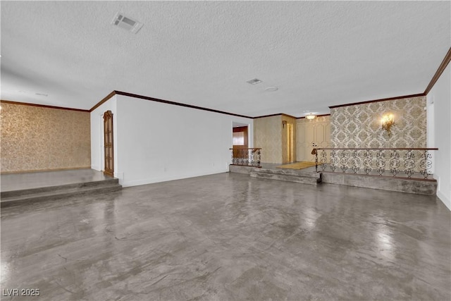 interior space featuring a textured ceiling, crown molding, and concrete flooring