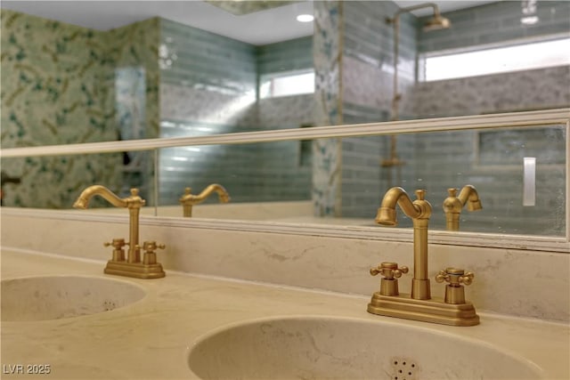 bathroom featuring plenty of natural light and vanity