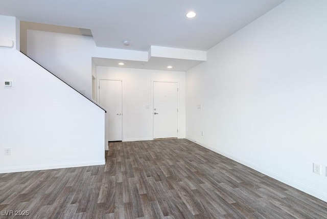 empty room featuring dark hardwood / wood-style floors