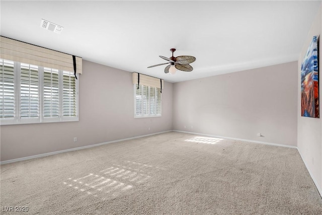 carpeted empty room with ceiling fan