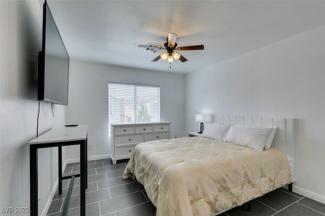 tiled bedroom with ceiling fan