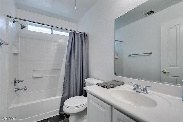 full bathroom featuring vanity, tile patterned flooring, toilet, and shower / bath combination with curtain