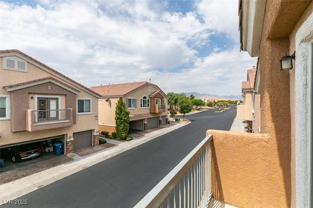 balcony featuring a mountain view