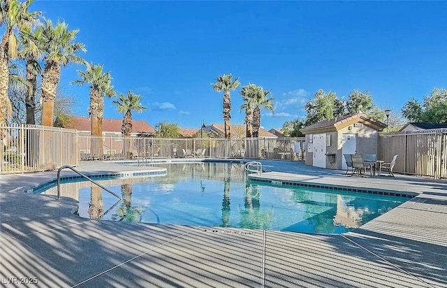 view of swimming pool featuring a patio area