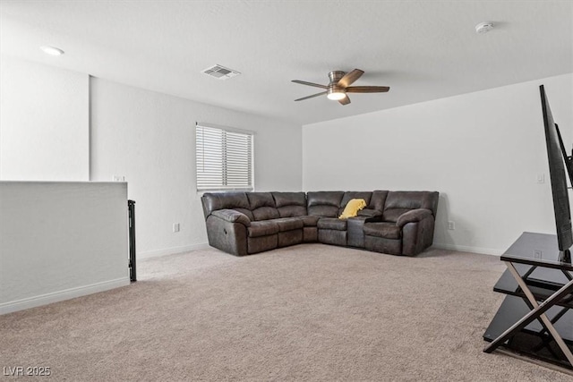 living room featuring ceiling fan and light carpet