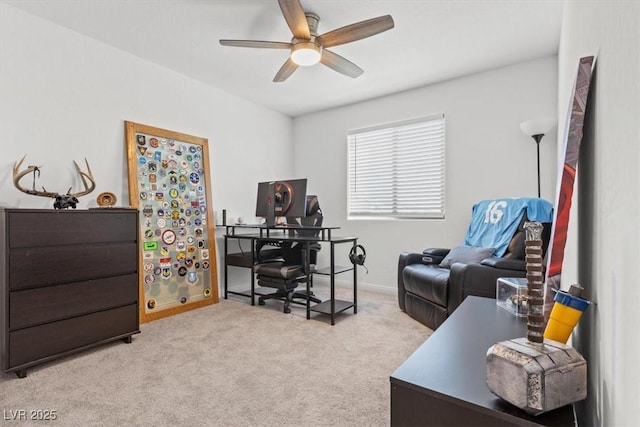 office space featuring light colored carpet and ceiling fan