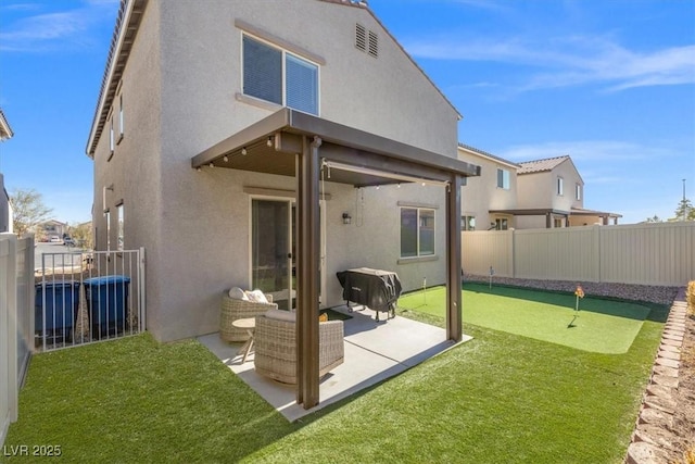 back of property with a patio and outdoor lounge area