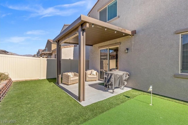 rear view of house with a patio