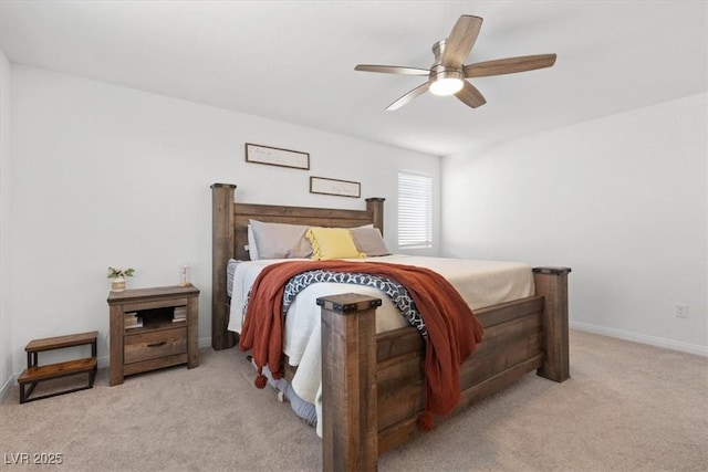 bedroom featuring ceiling fan and light colored carpet