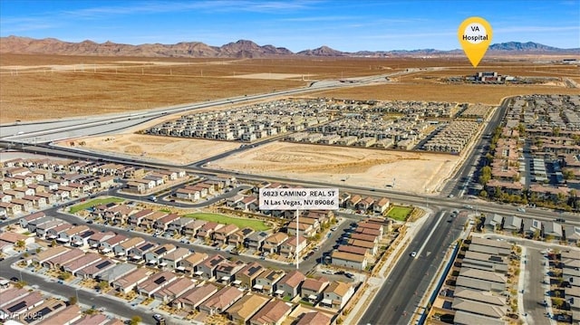 aerial view featuring a mountain view