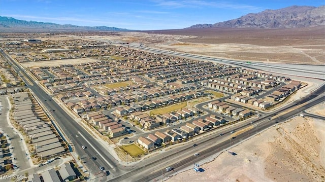 bird's eye view with a mountain view