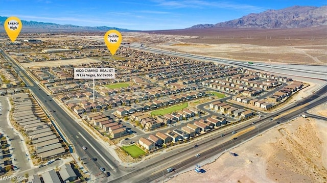 aerial view featuring a mountain view