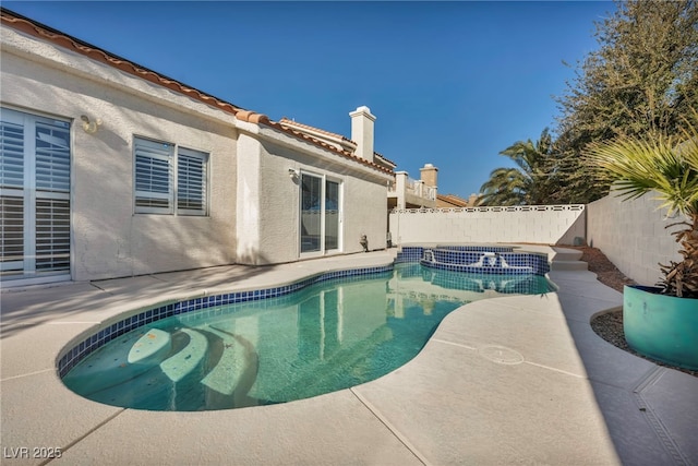 view of pool featuring a patio