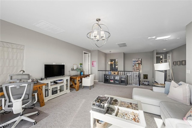 carpeted living room with a notable chandelier