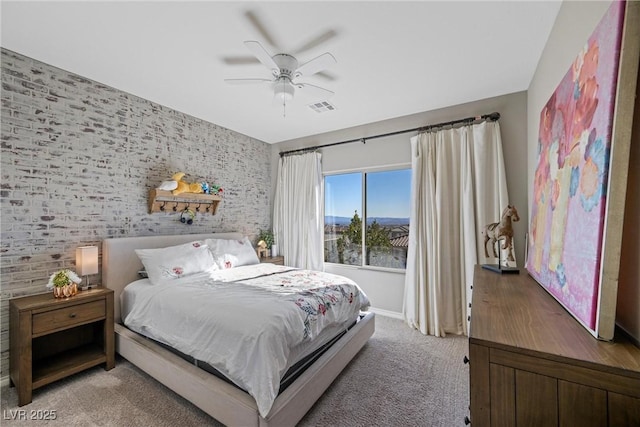 bedroom with ceiling fan and carpet