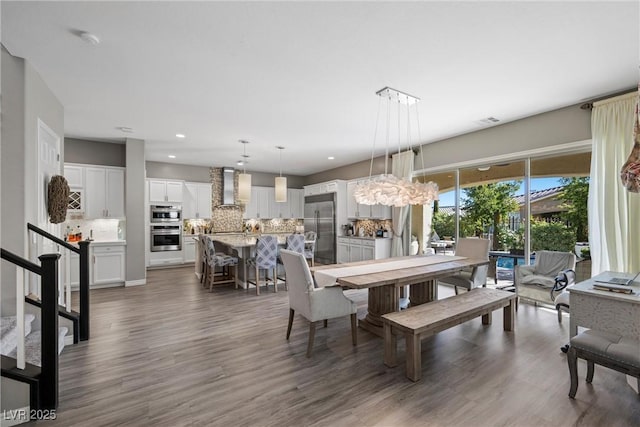 dining room with dark wood-type flooring