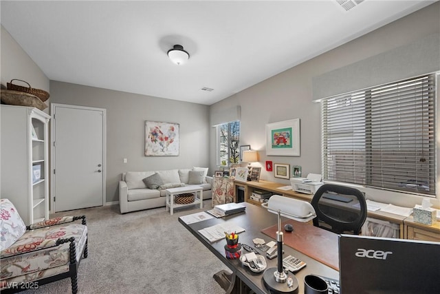 home office featuring light colored carpet