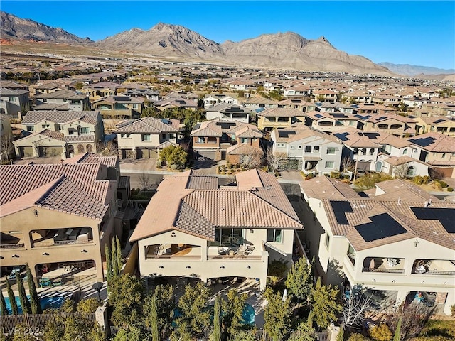 bird's eye view with a mountain view