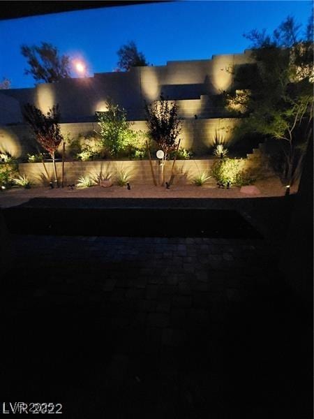 view of yard at night