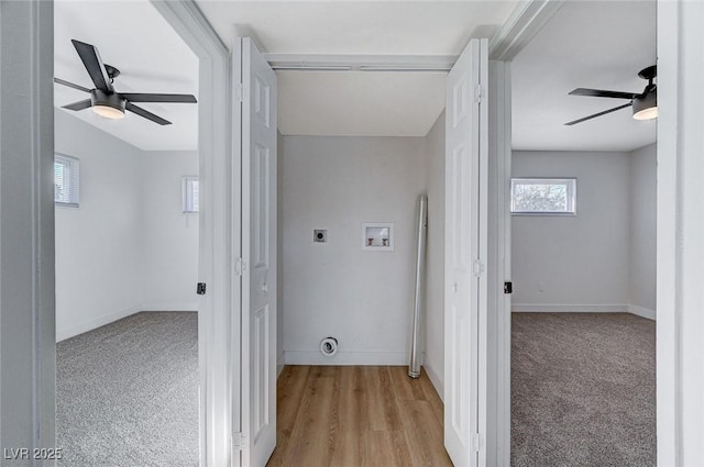 clothes washing area with electric dryer hookup, washer hookup, ceiling fan, and light colored carpet